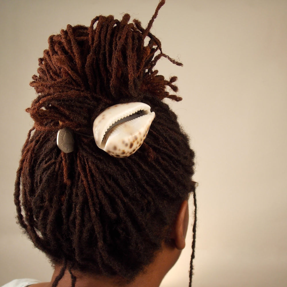 
                  
                    Cowrie Hair Tie Updo
                  
                